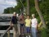Uncle Claire, Aunt Blanche, Tim & Mom on the dock.